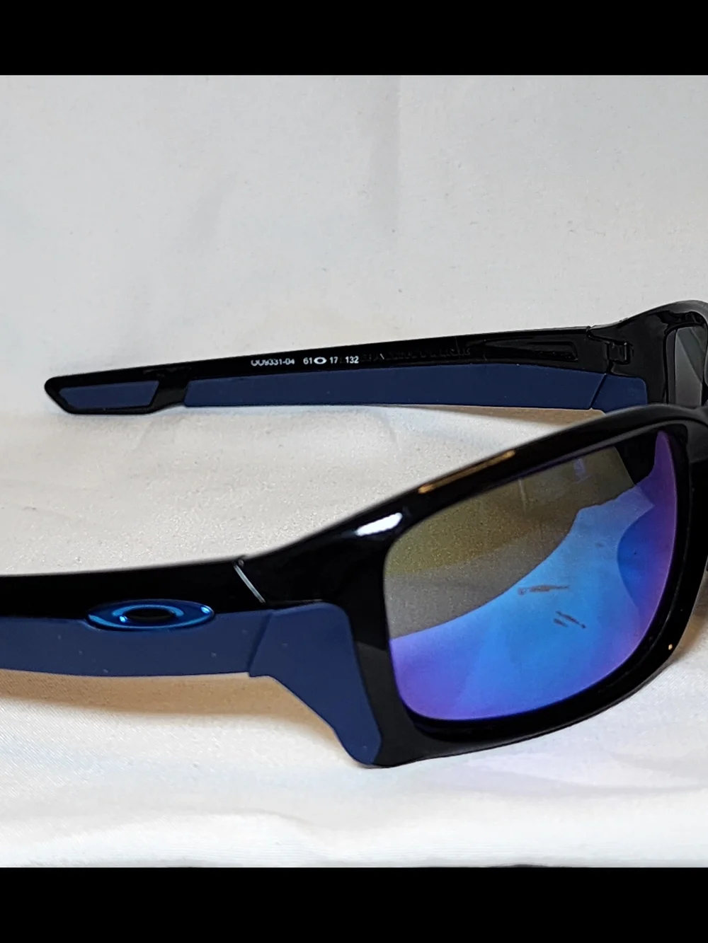 Oakley Black Sunglasses with Blue-Purple Mirrored Lenses